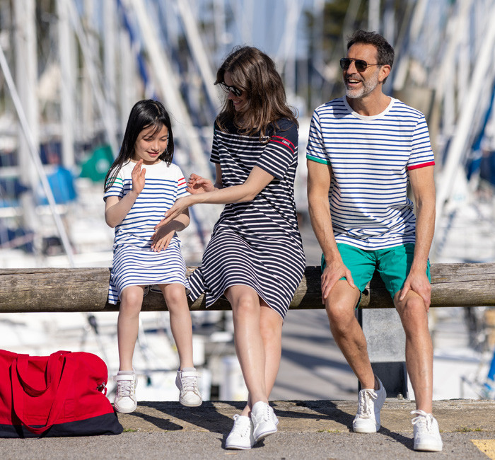 Man and woman wearing a Mousqueton port-starboard breton stripe t-shirt