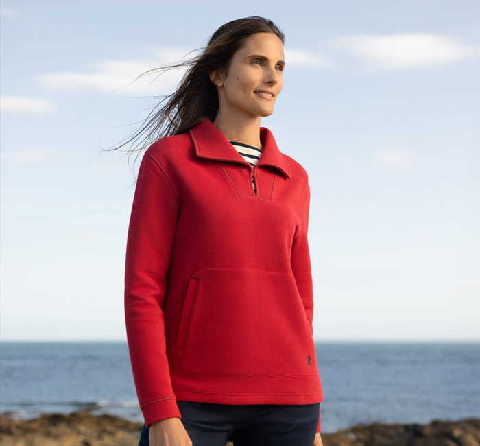 Woman wearing a red sweatshirt