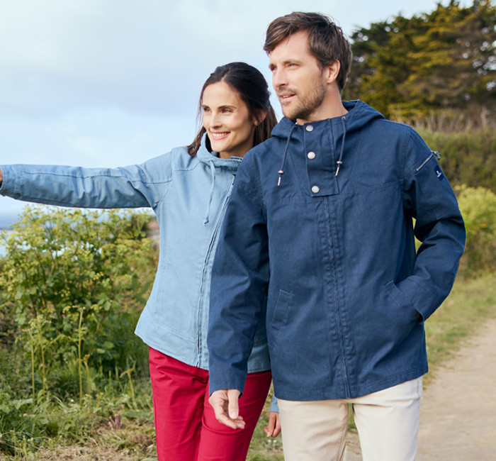 Man and woman wearing blue hooded jackets Mousqueton