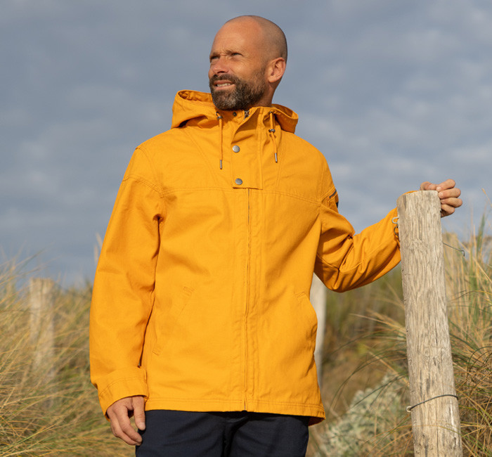 Man wearing a navy blue cotton canvas jacket