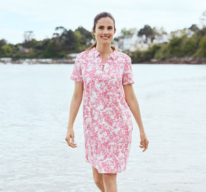 Woman wearing a light, printed dress