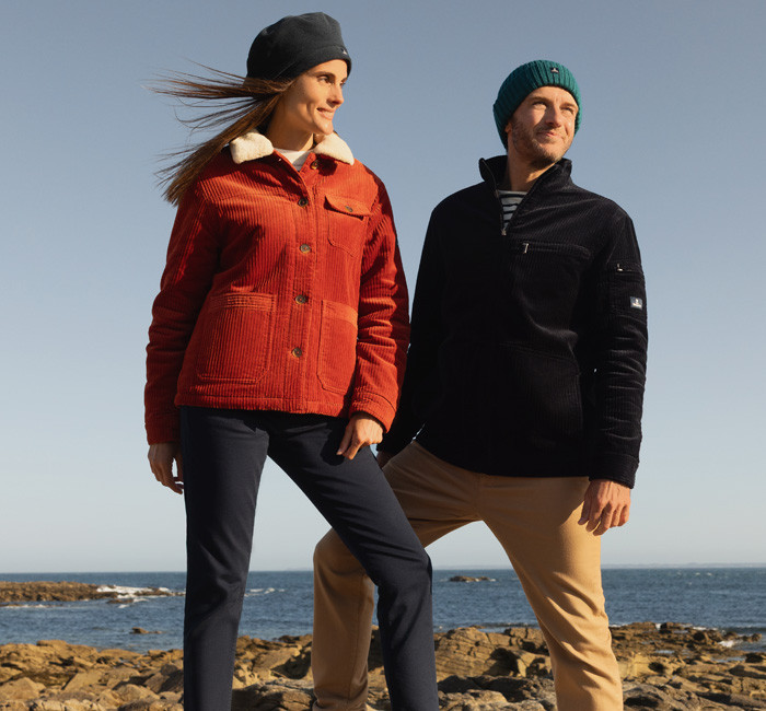 Man wearing a corduroy fisherman smock and woman wearing a corduroy blouse